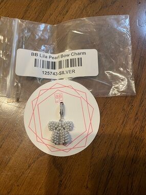 New in bag BB Lila Pearl Bow Charm - Silver